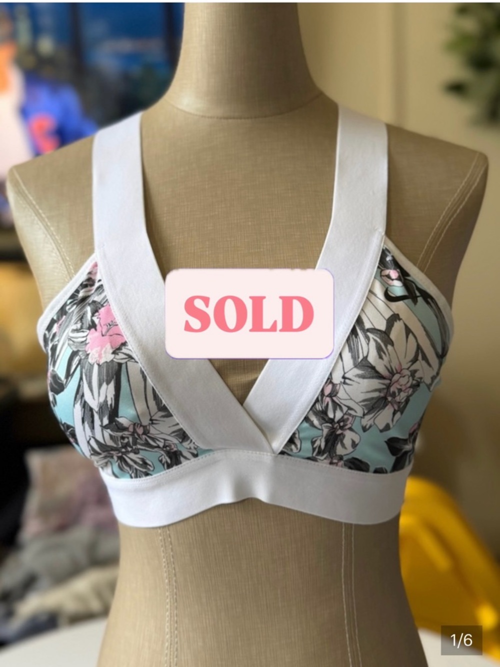 Nike Indy Light Hyper Femme sports bra in the blue/teal floral pattern
